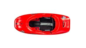 Ein rotes Wildwasserboot, genannt "Freesyler" Ein rotes Wildwasserboot, genannt "Freesyler"