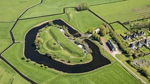 aerial view:CB2,UNESCO World Heritage Site:CB2,landscape:CB2,moat:CB2,fortress:CB2,meadow:CB2,pasture:CB2,water:CB2,daytime:CB2,outdoors:CB2,rural scene:CB2,nobody:CB2,scenic:CB2,Amsterdam:CB2,North Holland:CB2,Netherlands:CB2,physical geography:CB2,ditch:CB1 Netherlands, Markenbinnen, Fort Called Markenbinnen