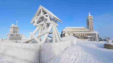 Fichtelberghaus, on the summit of Fichtelberg with snow in winter, Mount Fichtelberg, Oberwiesenthal, Erzgebirge, Ore Mountains, Saxony, Germany Sachsen