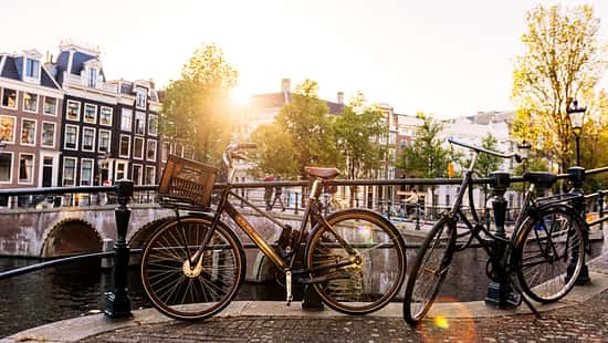 Bicycle by the canal in Amsterdam, Netherlands